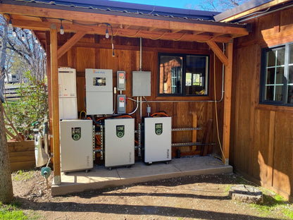 Three RUiXU Lithi2-16 batteries in an outdoor solar installation