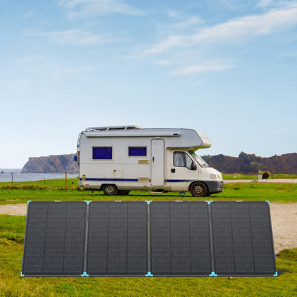 Renogy 300W N-Type portable solar suitcase — clean coastal RV lifestyle view
